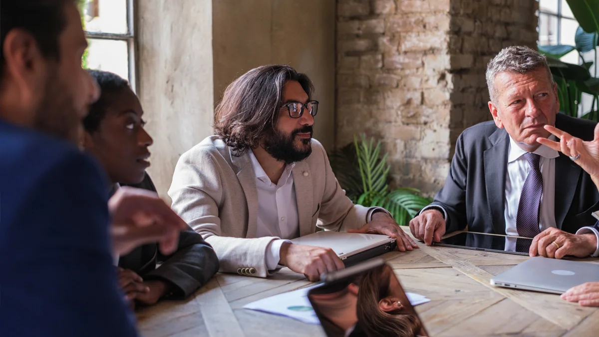Are meetings a waste of time or necessary for growth?